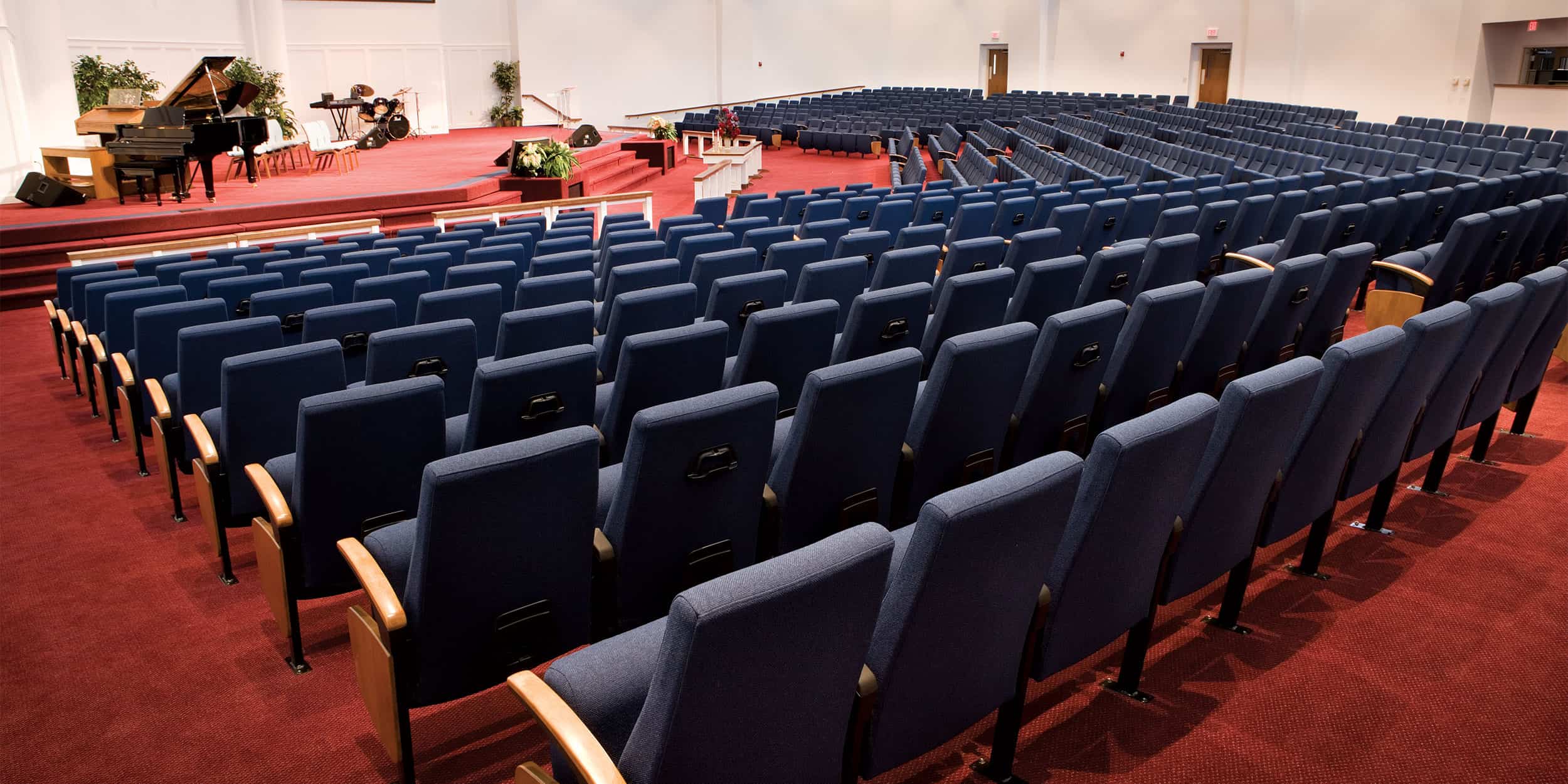 View of auditorium seats from back of church