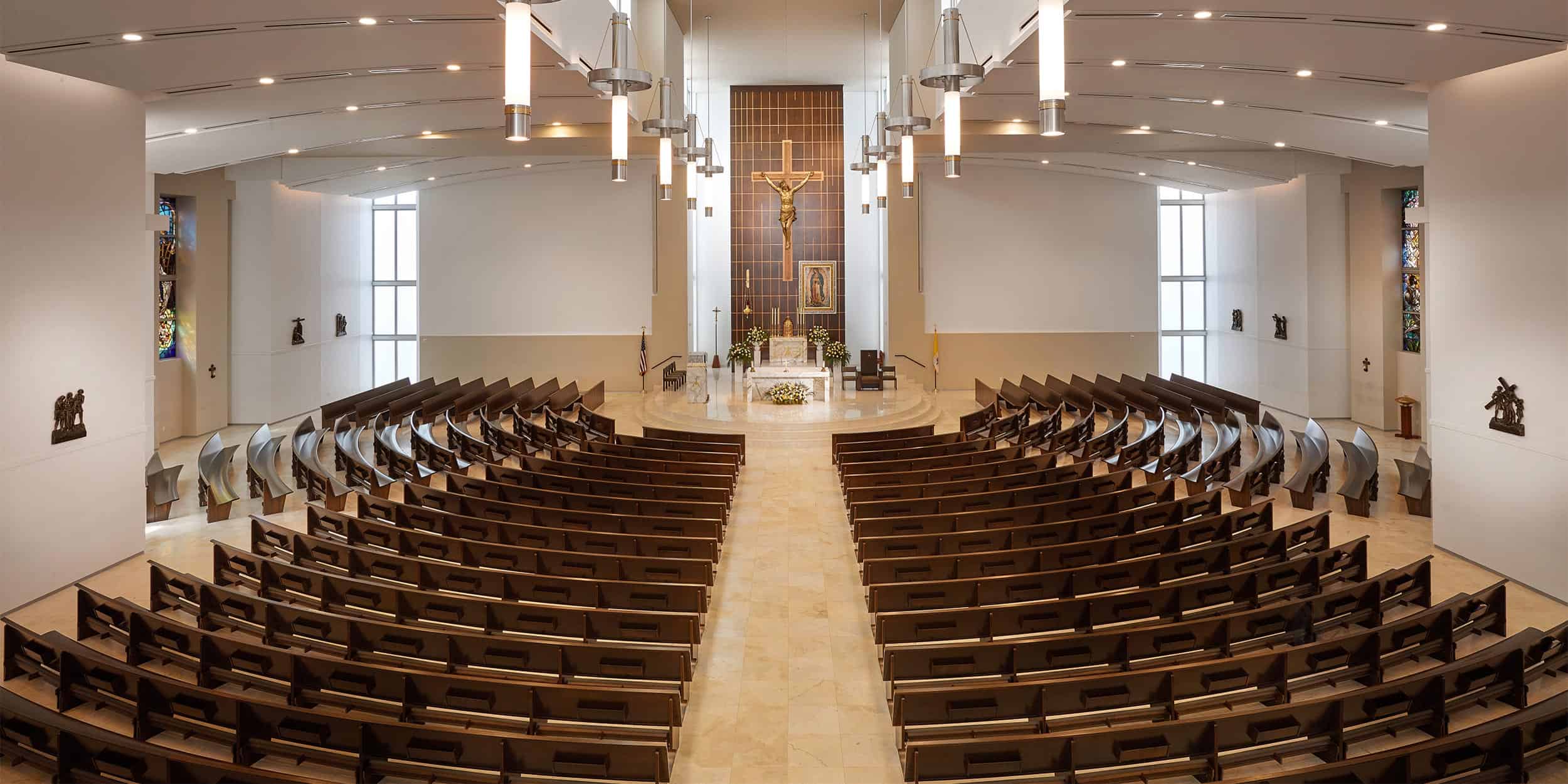 Round radial all wood pews from Sauder in Our Lady of Guadalupe located in Doral, FL