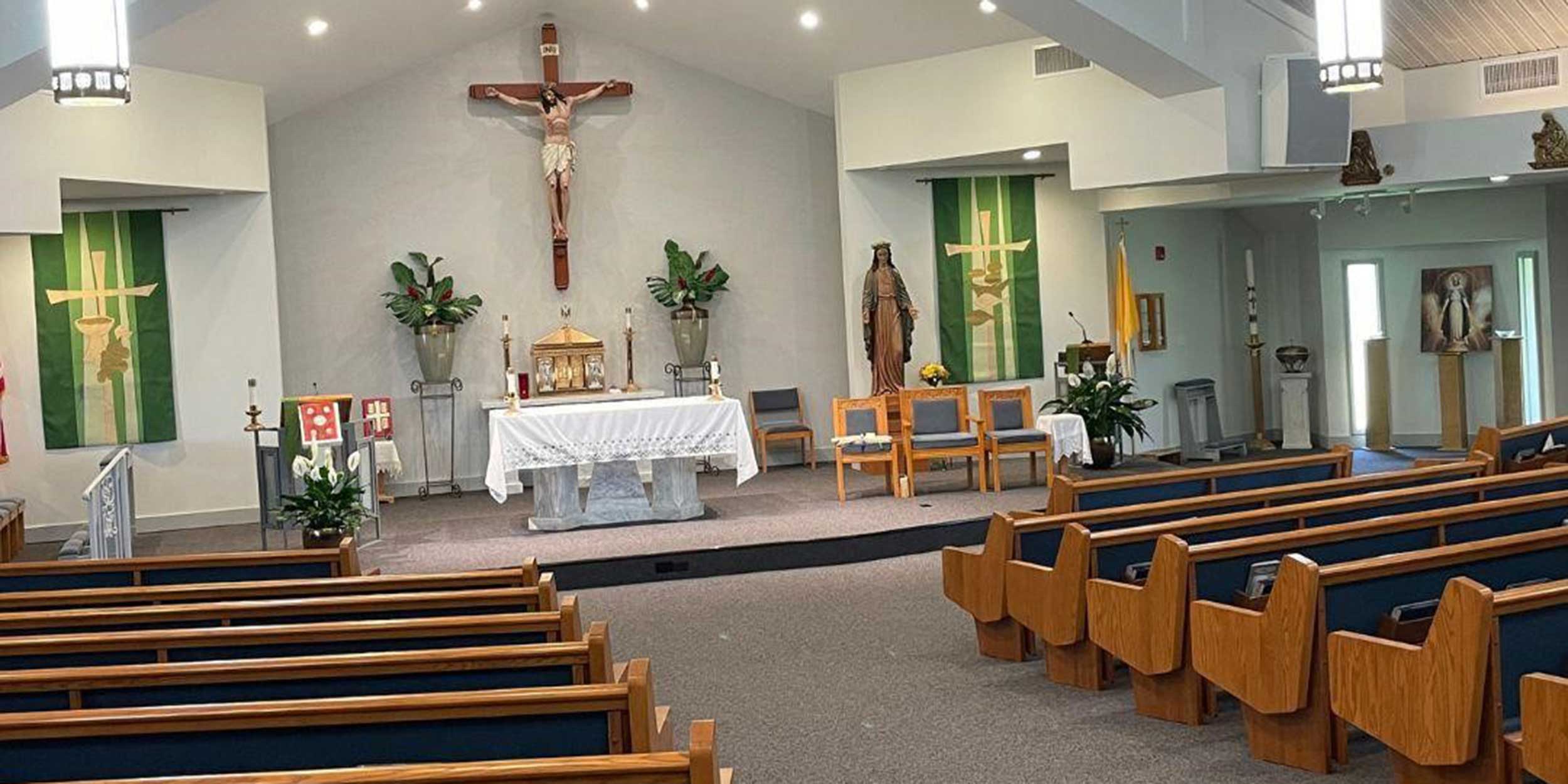 Wood pews with upholstered back from Sauder Worship Seating