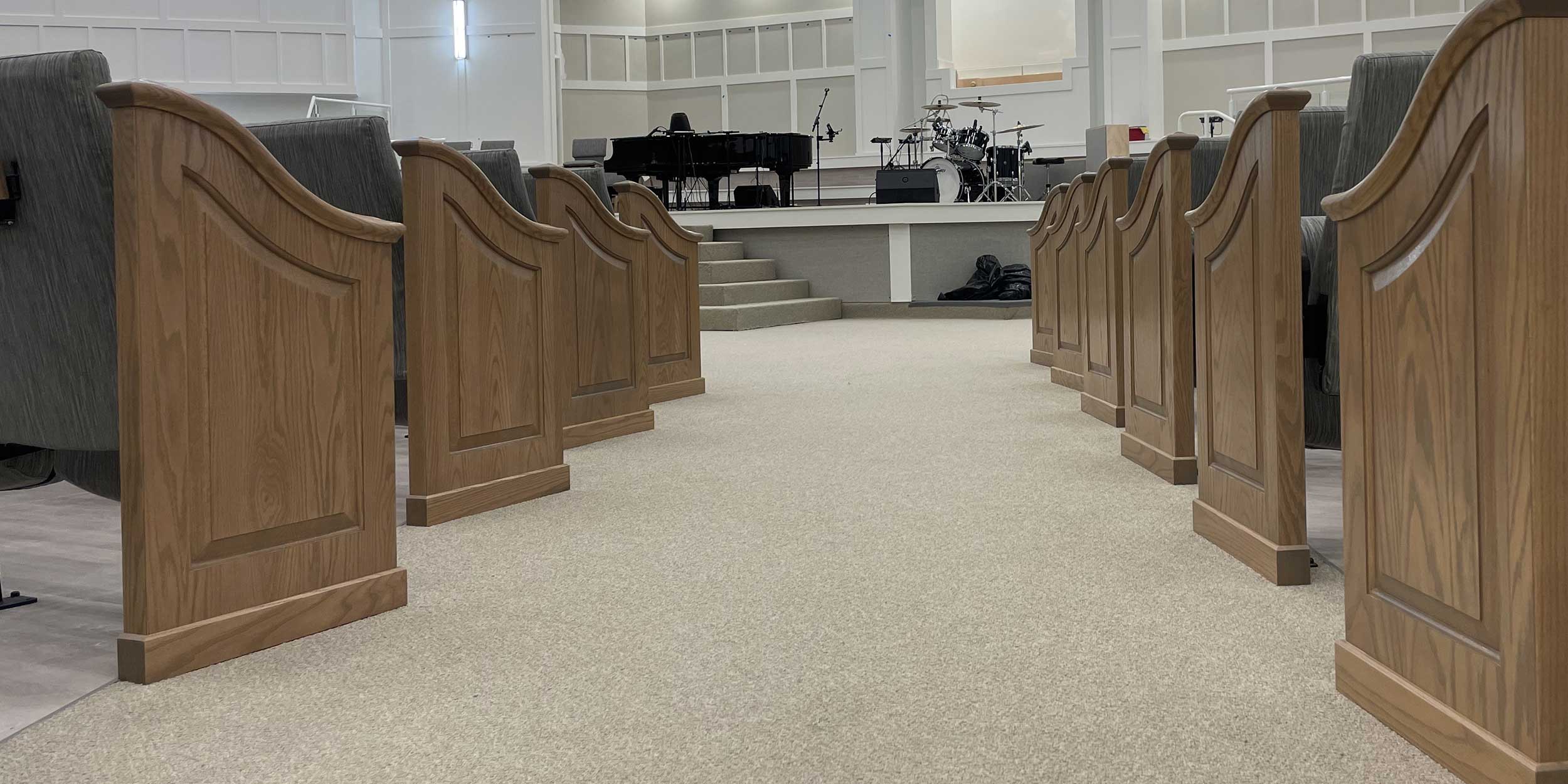 Auditorium Seating with pew ends from Sauder Worship
