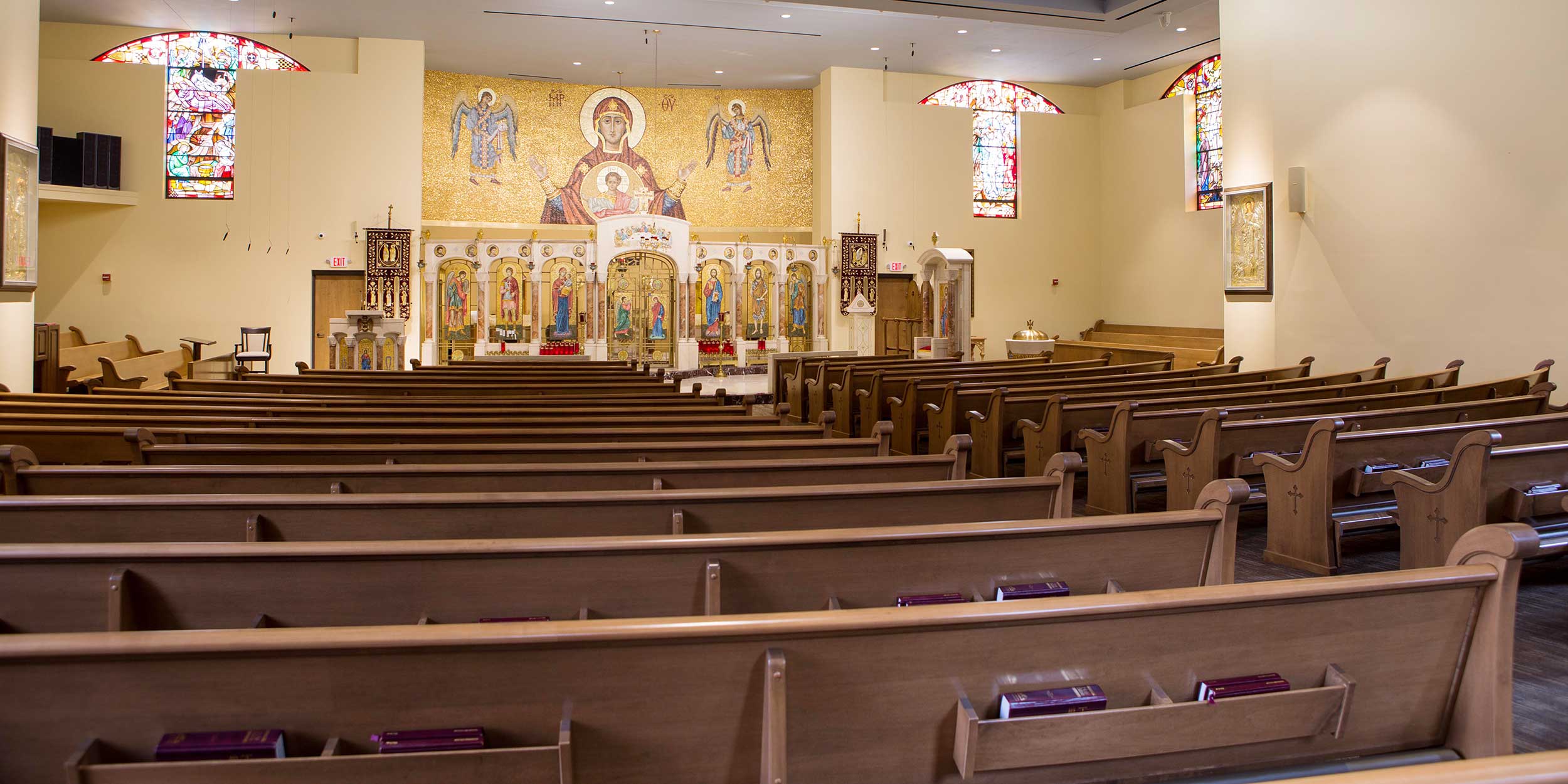 Solid wood curved radial pews from Sauder Worship Seating