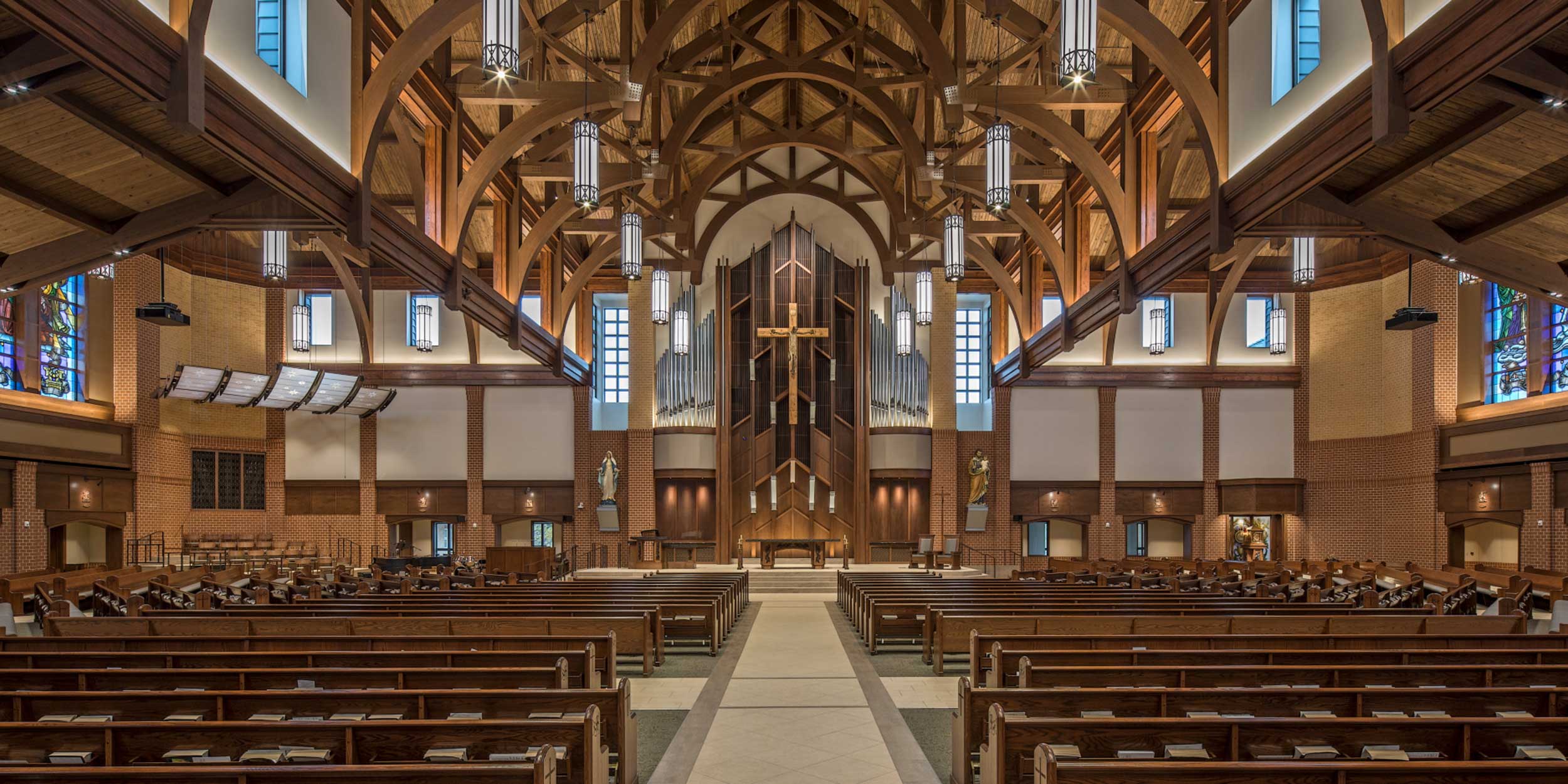 All wood pews from Sauder Worship Seating